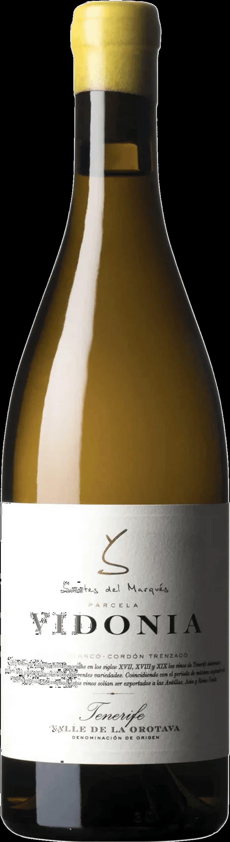 Flaska Suertes del Marqués vitt vin från Kanarieöarna, stående mot ljus bakgrund